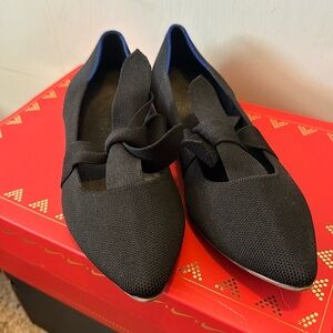 Rothy’s black flat with bow. Size 9, used but still great!
